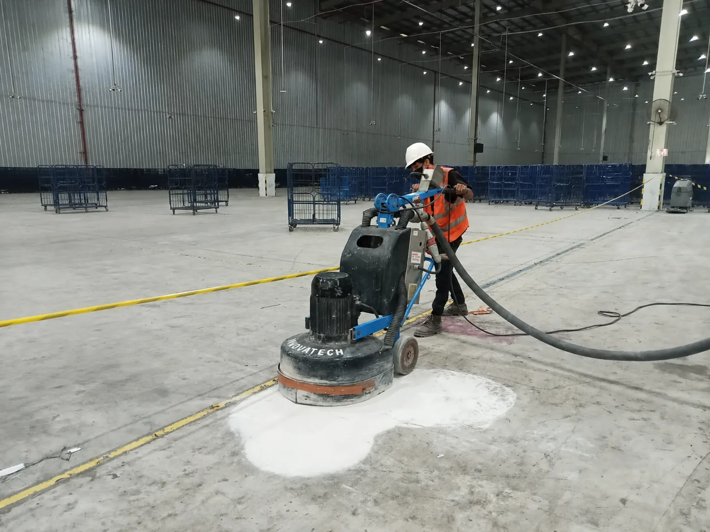Floor preparation underway inside a large operating facility